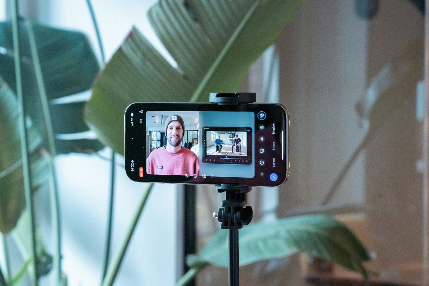 Smartphone on a tripod recording a creator video, the kind of off-Amazon social content that can carry an Amazon Attribution tag and earn a Brand Referral Bonus