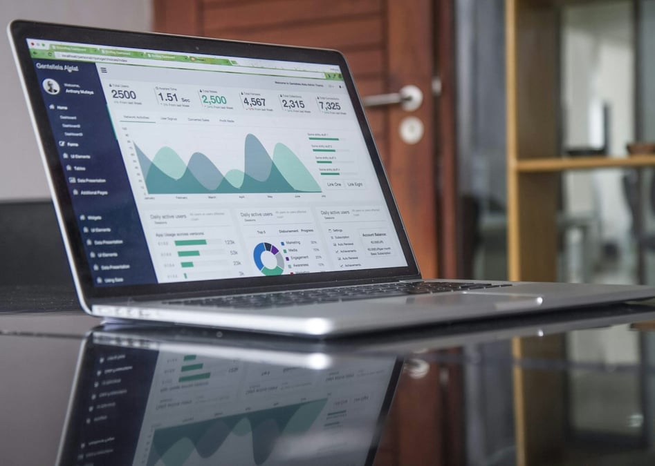 Seller monitoring Amazon Account Health and performance metrics on a laptop