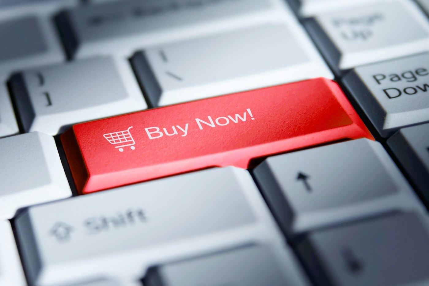 Red Buy Now key on a computer keyboard, representing orders from your own store fulfilled through Amazon MCF